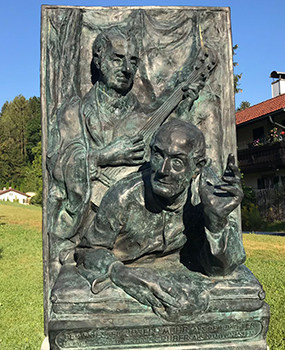 Bas relief sculpture
of Gruber and Mohr leading the singing of Silent Night