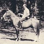 photo of Paul McGrady sitting on a horse