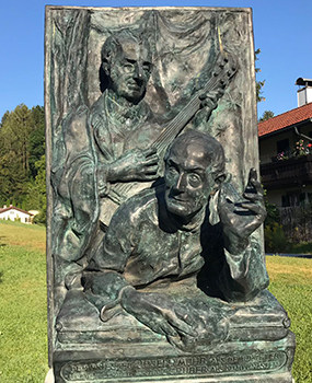 Bas relief sculpture
of Gruber and Mohr leading the singing of Silent Night