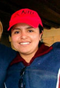 photo of smiling lady wearing
baseball cap